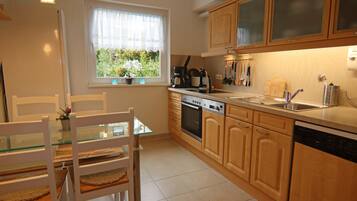 Comfort Apartment, 2 Bedrooms | Private kitchen | Fridge, microwave, oven, dishwasher