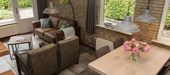 Cozy House With a Fireplace in a Holiday Park in a Natural Area