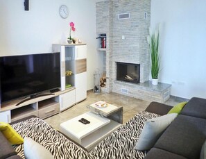 Hus – deluxe, 4 soverom | Oppholdsrom