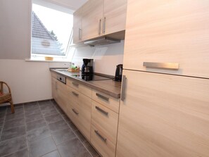 Comfort Apartment, 3 Bedrooms | Private kitchen | Fridge, dishwasher, coffee/tea maker, toaster