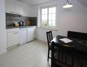 Premium Apartment, 2 Bedrooms | Private kitchen | Fridge, microwave, dishwasher, coffee/tea maker