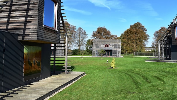 A modern building with a sloped roof and a satellite dish. - Chalet, Wendorf (Kuhlen-Wendorf)