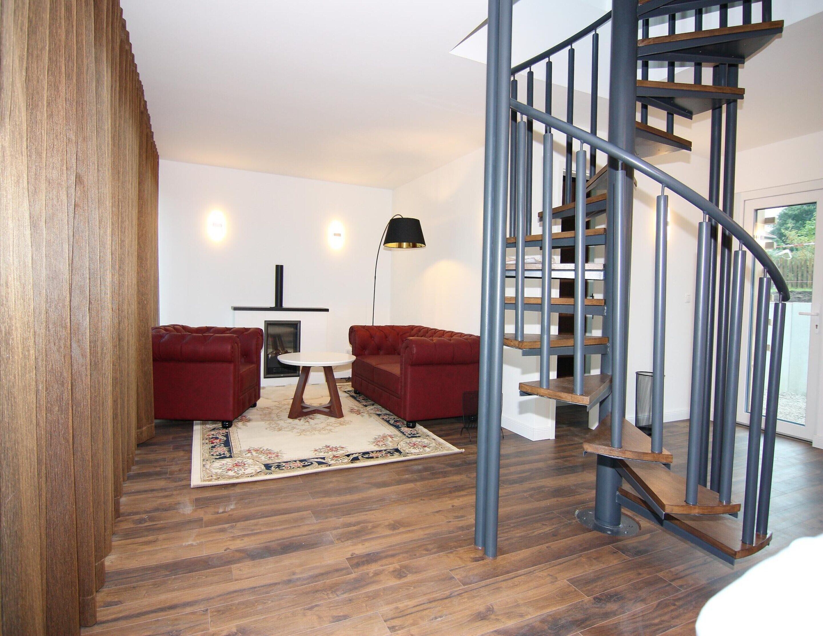 Casa clássico, 2 quartos | Sala de estar | Lareira