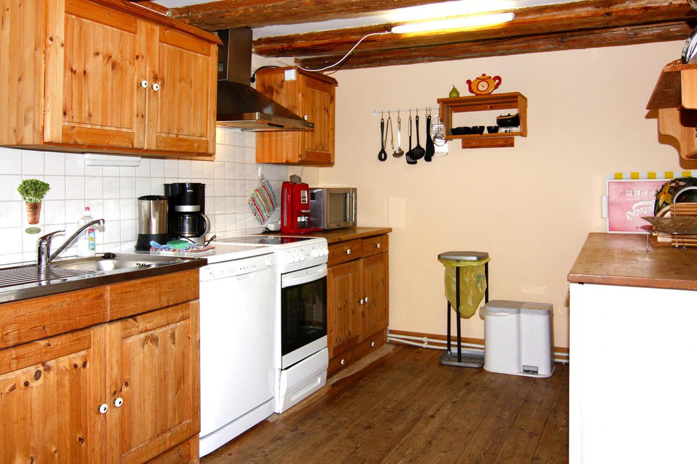 Casa Confort, 2 habitaciones | Cocina privada | Frigorífico, microondas, horno y lavavajillas