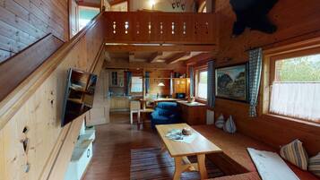 Comfort Chalet, 4 Bedrooms | Living room | Fireplace