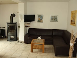 Classic Apartment, 2 Bedrooms | Living room | Fireplace