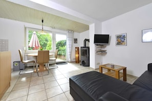 Classic Apartment, 2 Bedrooms | Living room | Fireplace