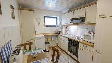 Comfort Apartment, 2 Bedrooms | Private kitchen | Fridge, microwave, oven, dishwasher