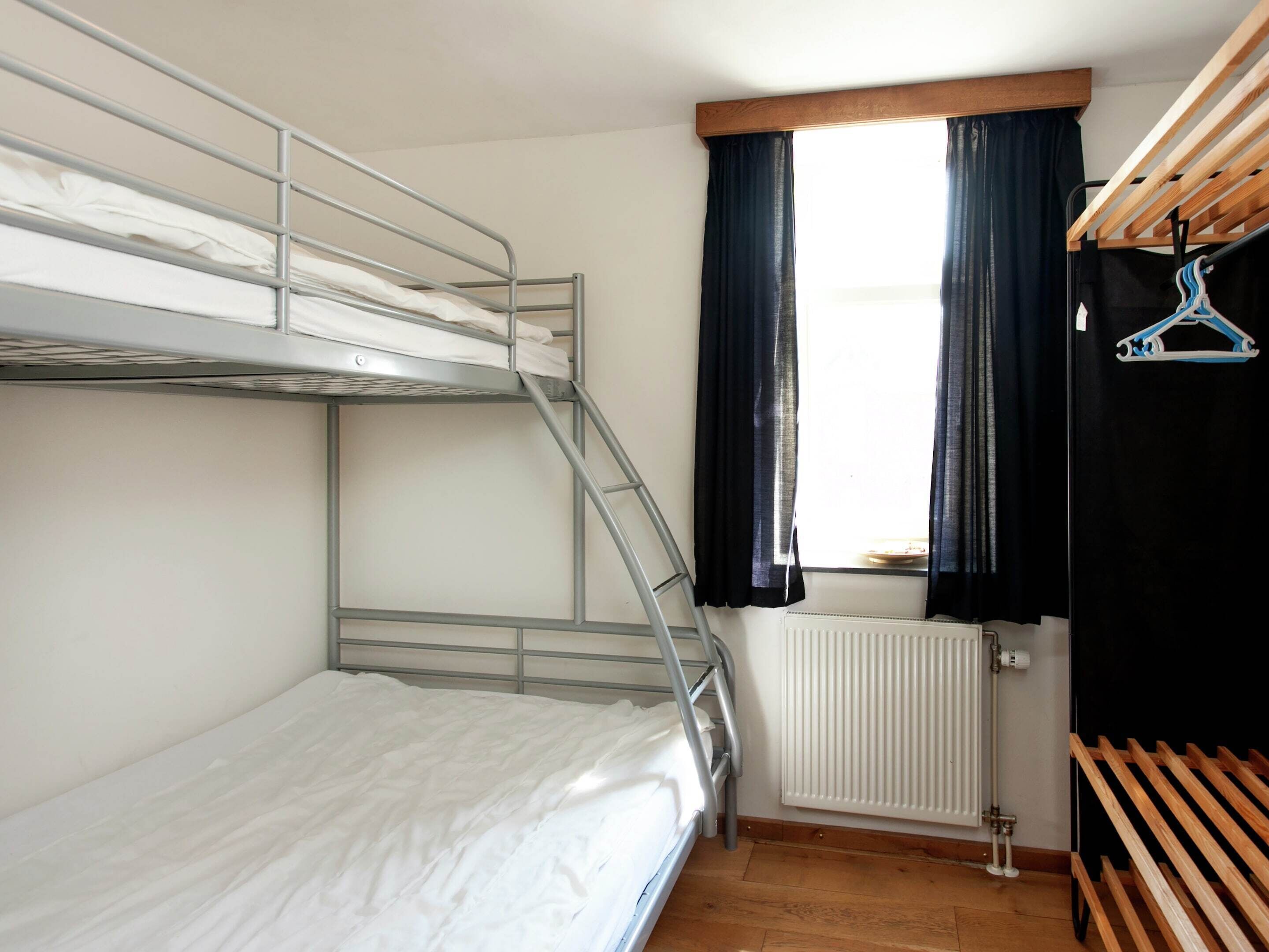 12 bedrooms, individually furnished, bed sheets