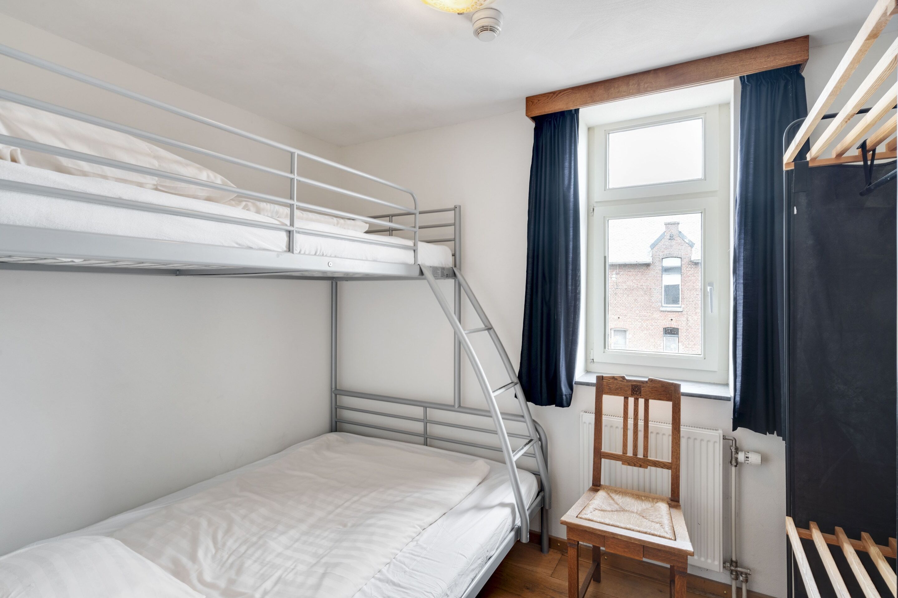 12 bedrooms, individually furnished, bed sheets