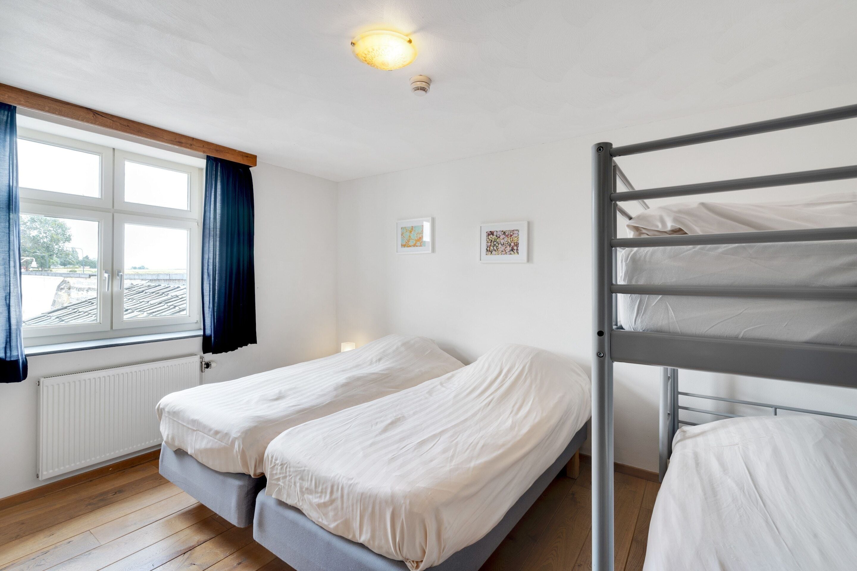 12 bedrooms, individually furnished, bed sheets