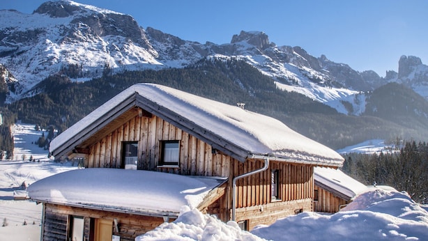A wooden cabin with a sloped roof, surrounded by snow-covered mountains and a clear sky. - Chalet in Annaberg-lungotz With a Community Pool (Annaberg-Lungoetz)