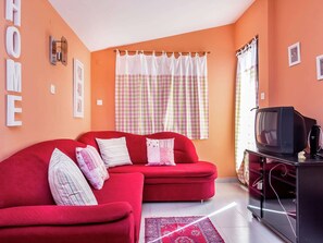 Deluxe appartement, 2 slaapkamers | Woonkamer