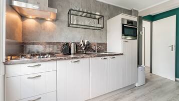 Comfort House, 3 Bedrooms | Private kitchen | Fridge, microwave, dishwasher, coffee/tea maker