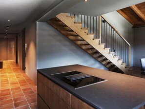 Departamento Confort, 4 habitaciones | Cocina privada | Refrigerador, microondas, horno y lavavajillas 