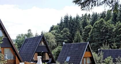 Wooden Chalet With Terrace Near a Swimming Lake
