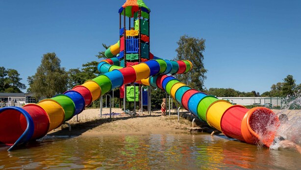 A water play area with a colorful slide structure and water jets. - Neat Chalet With Microwave, Antwerp at 39 km (Rijkevorsel)