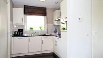 Casa Elite, 3 habitaciones | Cocina privada | Microondas y lavavajillas
