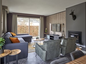 Apartamento conforto, 3 quartos | Sala de estar | DVD player