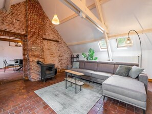 Classic Apartment, 3 Bedrooms | Living room | Fireplace