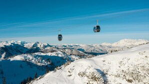 A cable car system in a snowy mountainous area. - Top Holiday Home in Kleinarl Near Cross-country Ski Trail (Kleinarl)