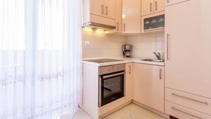 Classic Apartment, 3 Bedrooms | Private kitchen - Tasteful Apartment in Medulin With Private Balcony (Medulin)