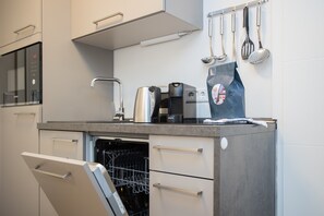Departamento Confort, 2 habitaciones | Cocina privada | Refrigerador, microondas, horno y lavavajillas