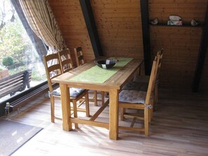 Deluxe House, 2 Bedrooms | Dining - Wooden Bungalow With a Terrace, in a Wooded Area (Ronshausen)