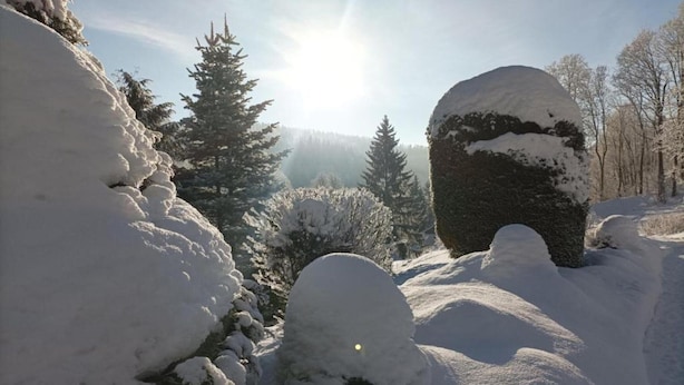 A snowy landscape with large snow-covered boulders and evergreen trees. - Attractive Apartment in Rokytnice nad Jizerou Near Ski Area (Rokytnice nad Jizerou)