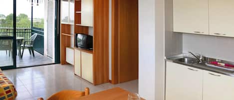 Classic Apartment, 3 Bedrooms | Private kitchen | Fridge, microwave, coffee/tea maker