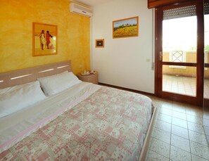 Comfort Apartment, 3 Bedrooms | 4 bedrooms, individually furnished, bed sheets - Holiday Resort Villaggio Selene, Bibione Spiaggia (San Michele al Tagliamento)