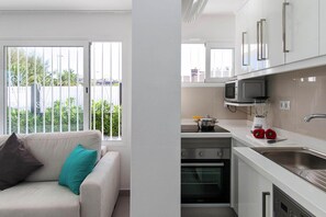 Classic Bungalow, 2 Bedrooms | Private kitchen | Fridge, microwave, oven, dishwasher