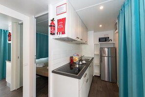 Classic Mobile Home, 3 Bedrooms | Private kitchen | Fridge, coffee/tea maker - Residence The Garda Village in Sirmione (Sirmione)