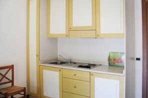 Apartemen Elite, 2 kamar tidur | Dapur pribadi | Lemari es dan microwave