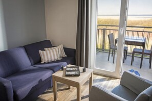 Apartamento conforto, 3 quartos | Sala de estar