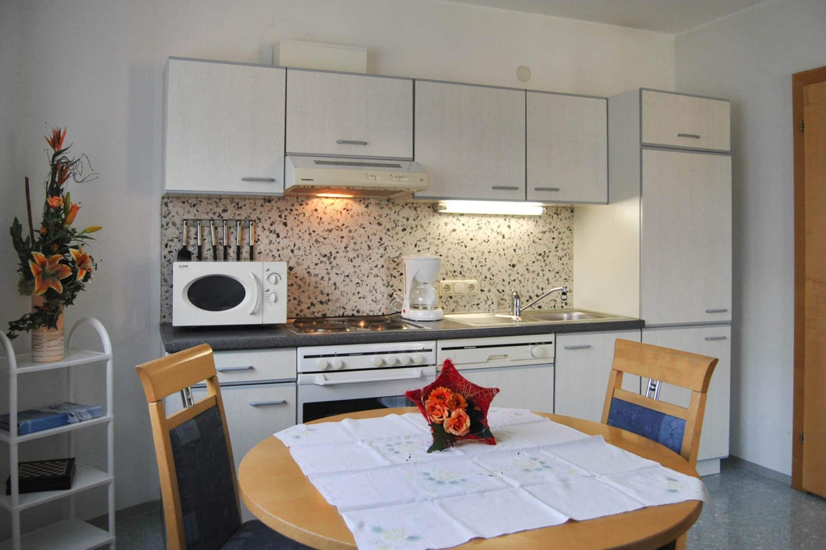 Fridge, oven, dishwasher, coffee/tea maker