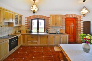 Comfort House, 5 Bedrooms | Private kitchen | Fridge, oven, coffee/tea maker, electric kettle