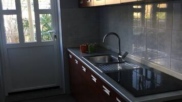 Apartment (Three Bedroom Apartment with Terrace) | Private kitchen | Fridge