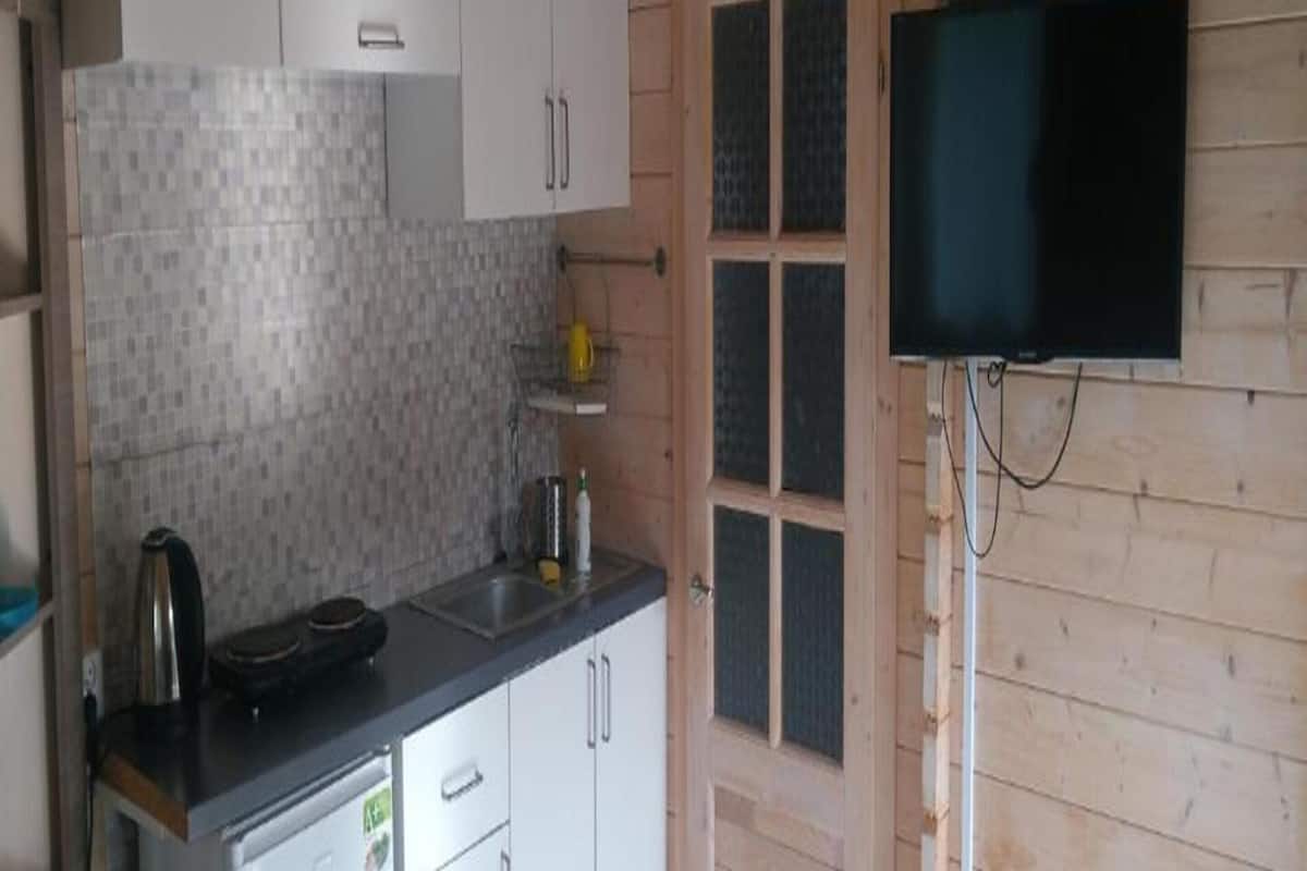 Fridge, electric kettle, high chair