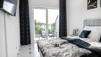 Appartement Classique, 2 chambres | Salle de séjour | Cheminée