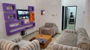 Living area - Residence chez Jeanne furnished apartment 3 in Cotonou (Godomey)