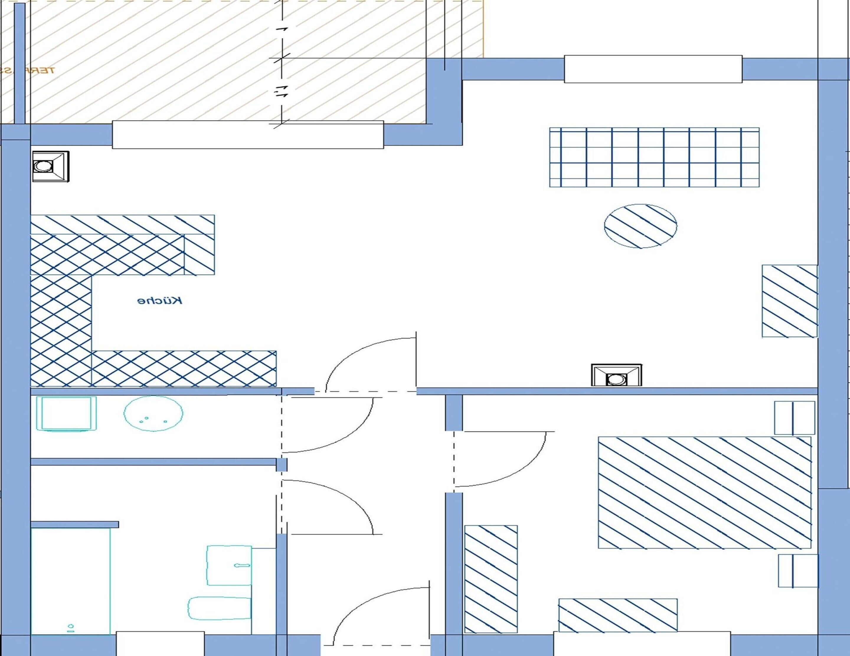 A floor plan with a kitchen, dining area, and a living room.