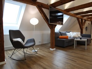 Leilighet – classic, 1 soverom | Oppholdsrom | Peis