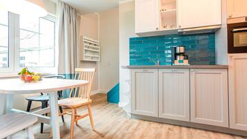 Classic Apartment, 3 Bedrooms | Private kitchen | Fridge, microwave, dishwasher, coffee/tea maker