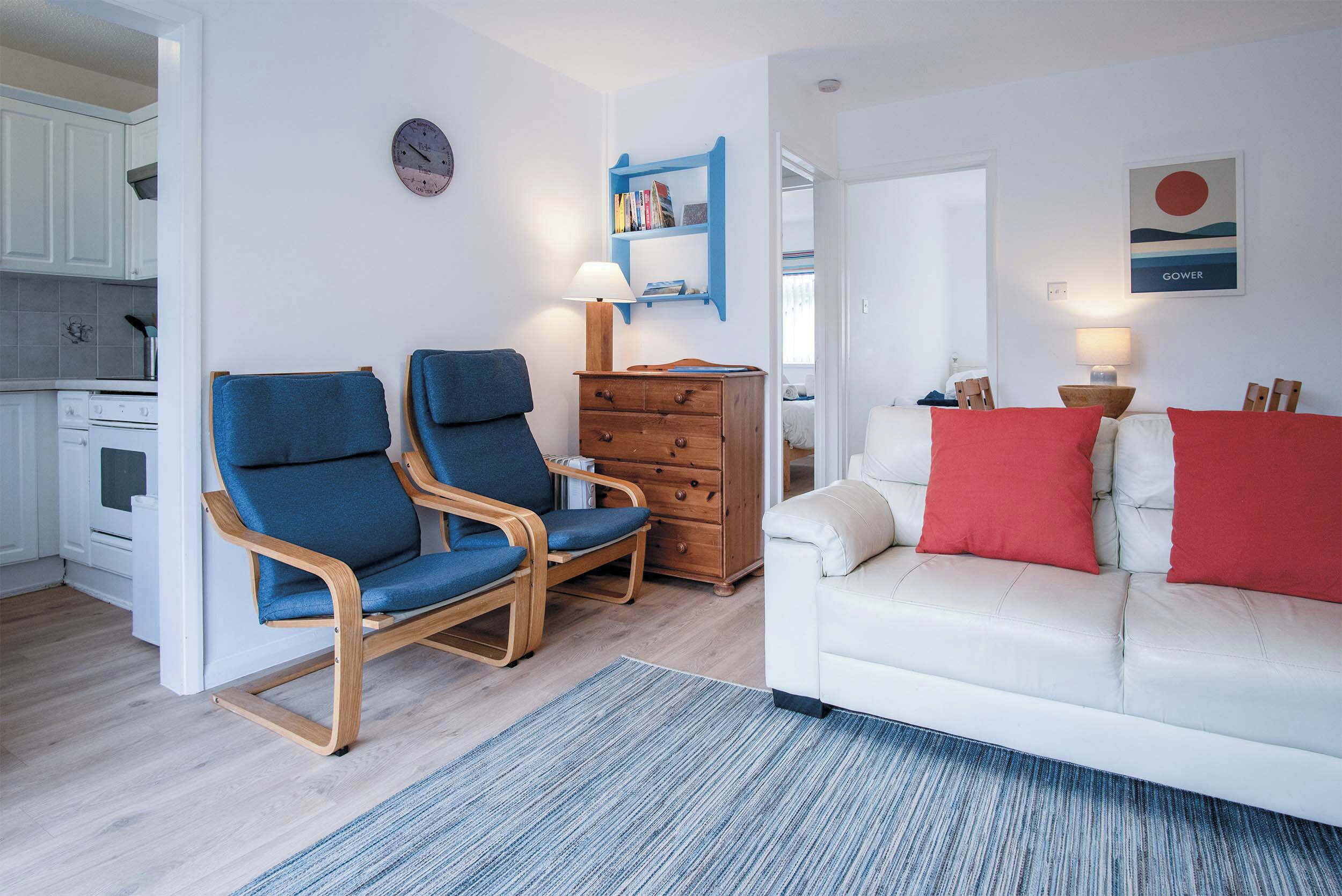 Standard Chalet | Living area | 32-inch flat-screen TV with cable channels