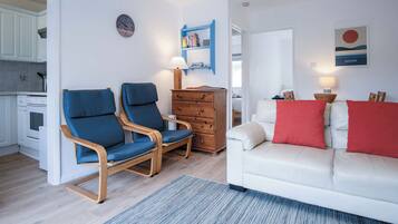 Standard Chalet | Living area | 32-inch flat-screen TV with cable channels