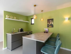 Comfort Bungalow, 2 Bedrooms | Private kitchen - Radiant Bungalow With Patio at Duinland (Sint Maartensvlotbrug)