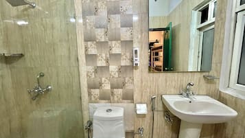 Superior Quadruple Room | Bathroom | Shower, free toiletries, towels, soap