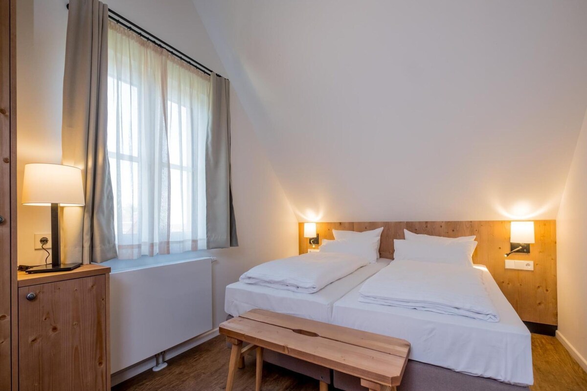 8 室のベッドルーム、客室ごとに異なるインテリア