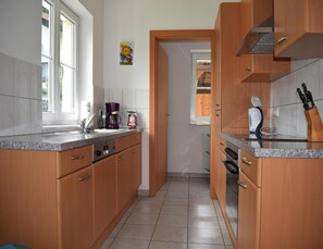 Fridge, oven, dishwasher, coffee/tea maker